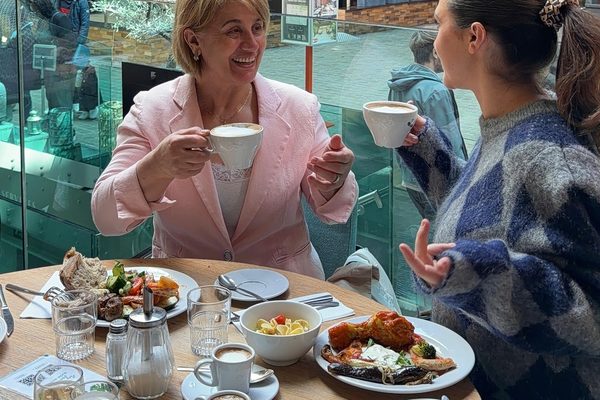 A brunch table looking onto the Royal Warehouse gallery.