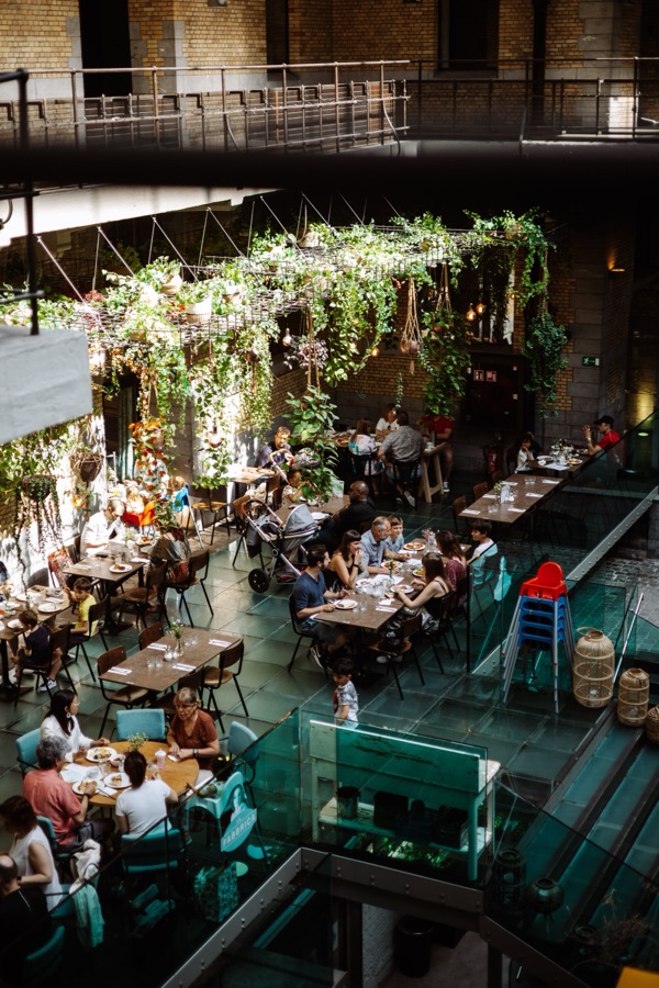 The indoor terrace beneath the Royal Warehouse glass roof.